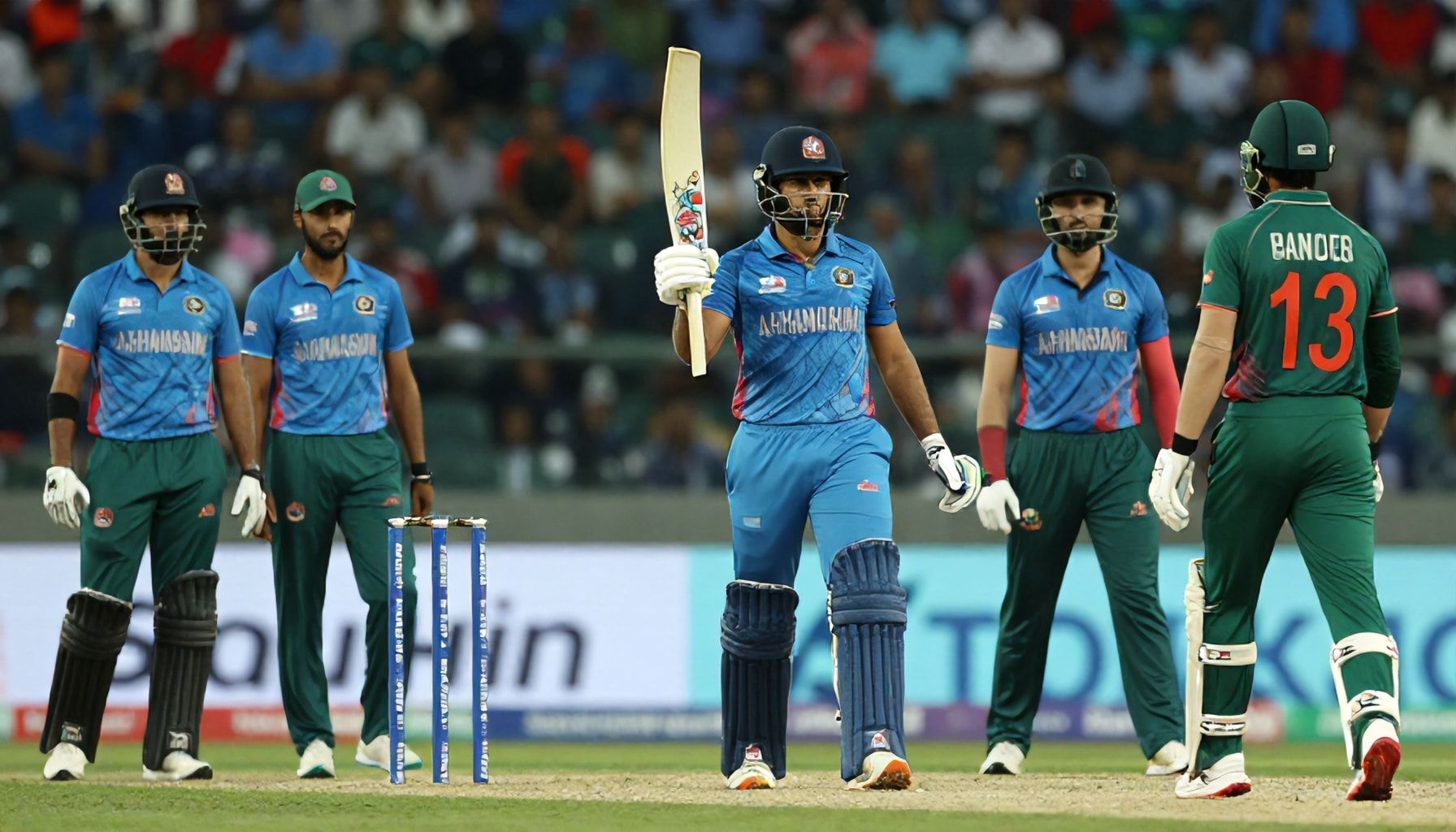 Afghanistan's Bowlers Shine in Narrow T20 Win Over Bangladesh